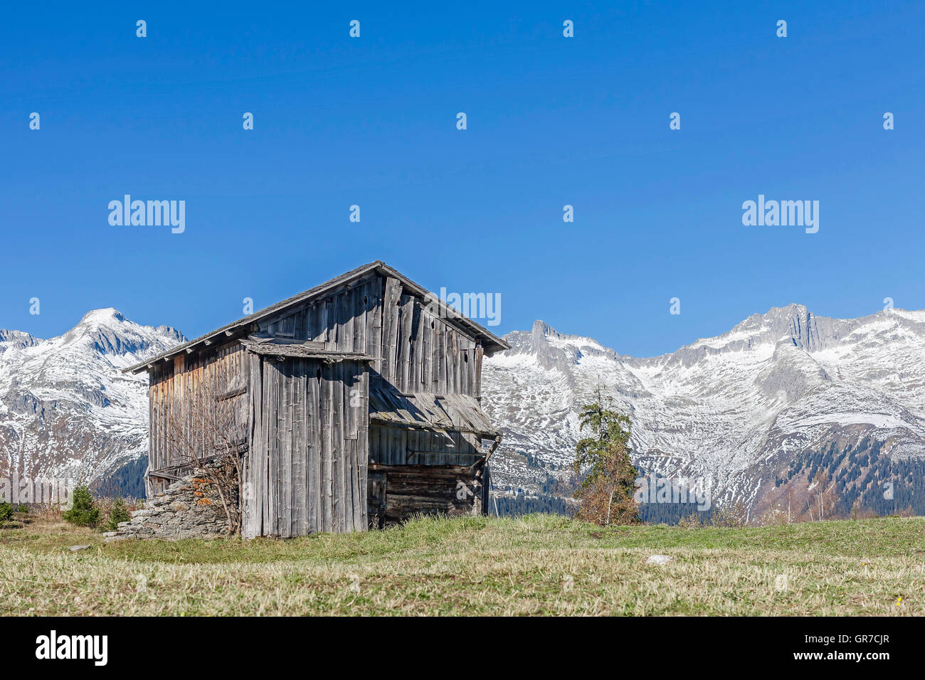 Mountain Landscape With Hay Hut In Val Medel In Switzerland Stock Photo