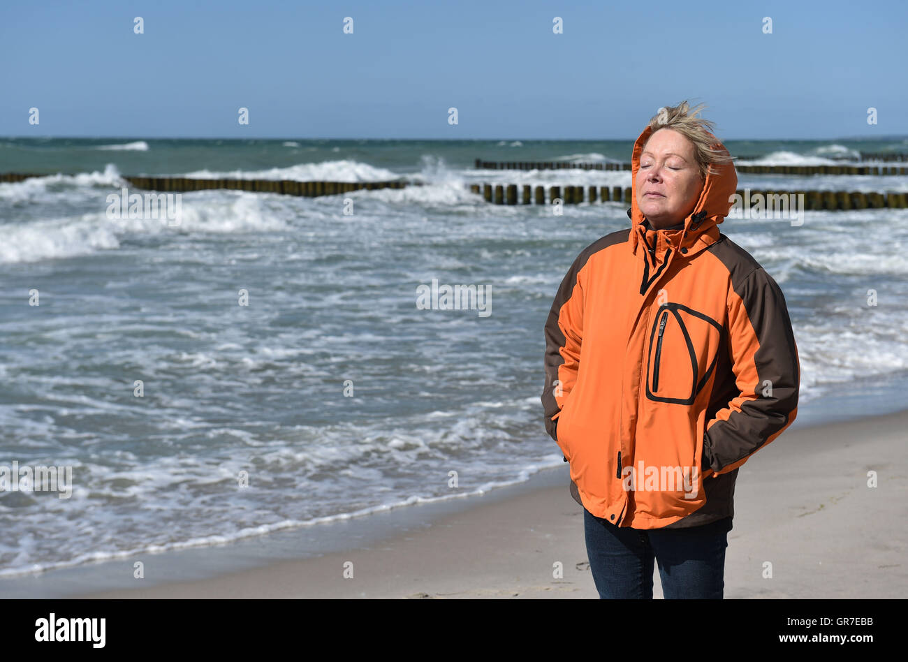 Woman On The Beach Stock Photo