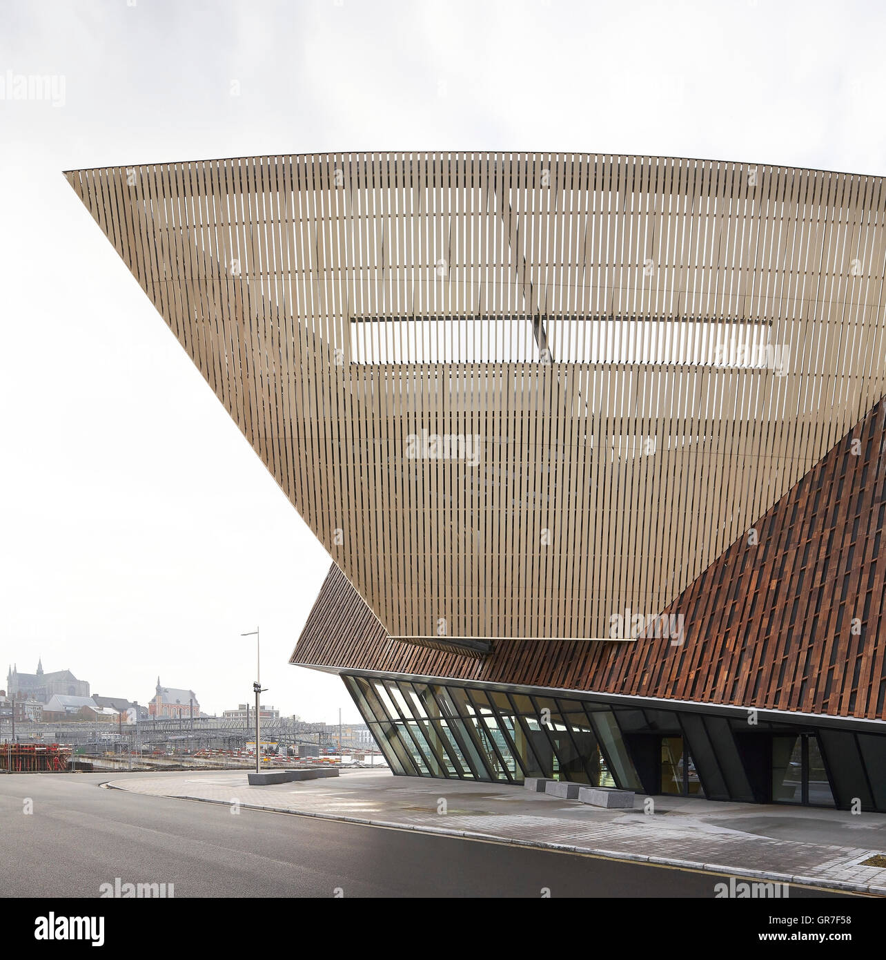 Partial view of exterior with urban context. Centre du Congres, Mons, Belgium. Architect: Libeskind, 2015. Stock Photo