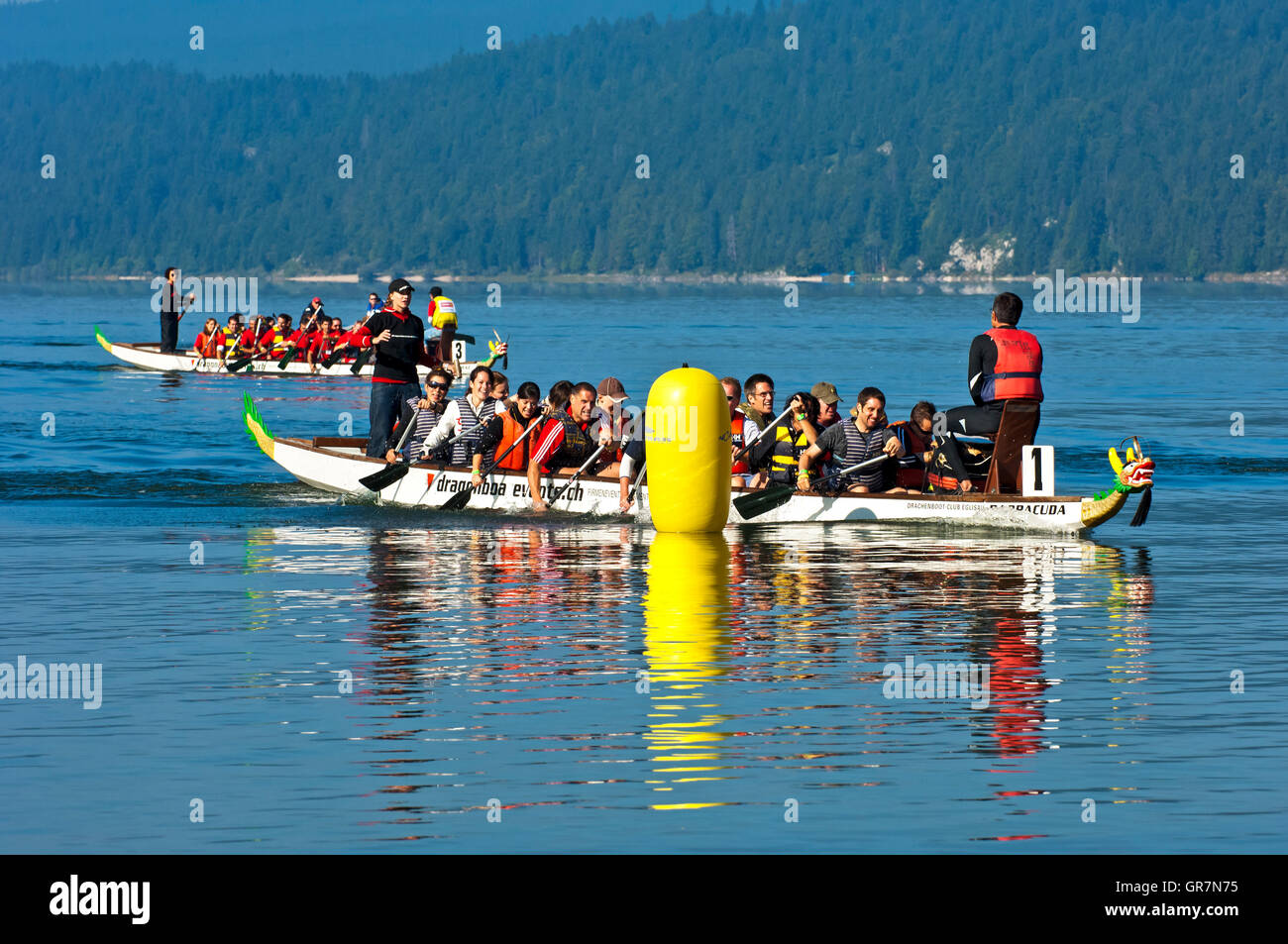 Dragon Boat At The Finishing Line Of A Boat Race On The Lake Lac De Joux, Vallée De Joux, Canton Of Vaud, Switzerland Stock Photo