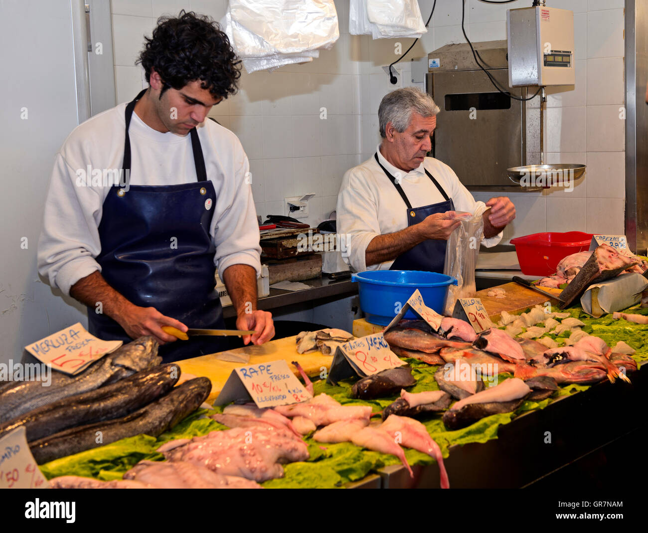 Fish Mongers On The Cadiz Fish Market, Cadiz, Spain Stock Photo