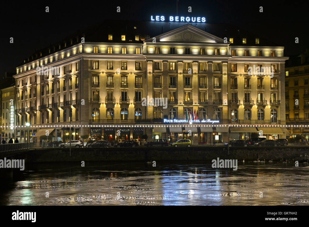 Four Seasons Hotel Des Bergues At Night, Geneva, Switzerland Stock Photo -  Alamy