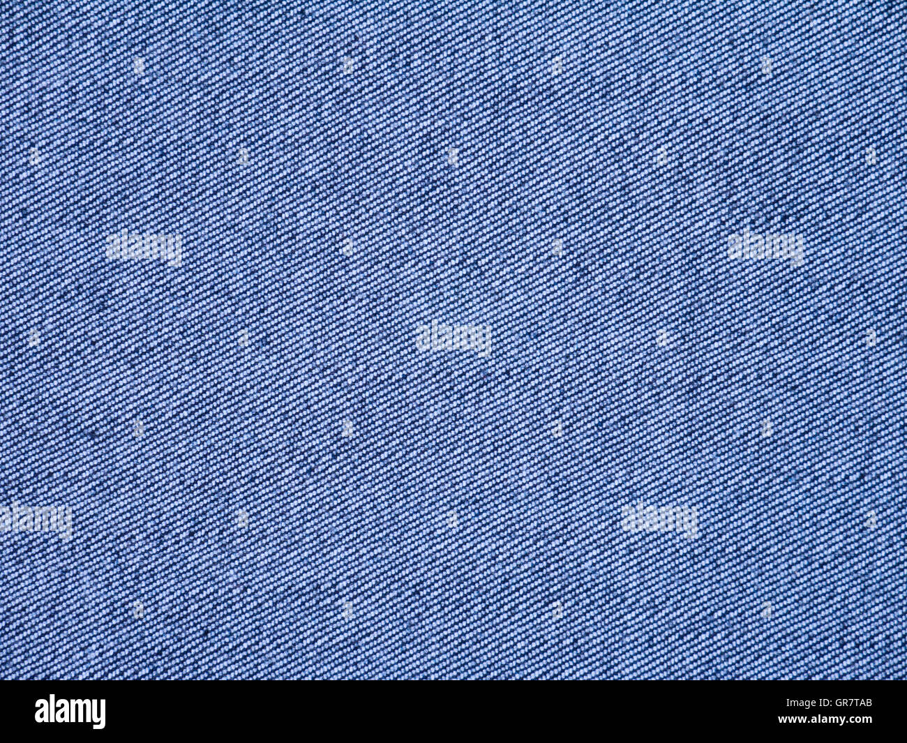 Blue washed denim fabric inside out background Stock Photo