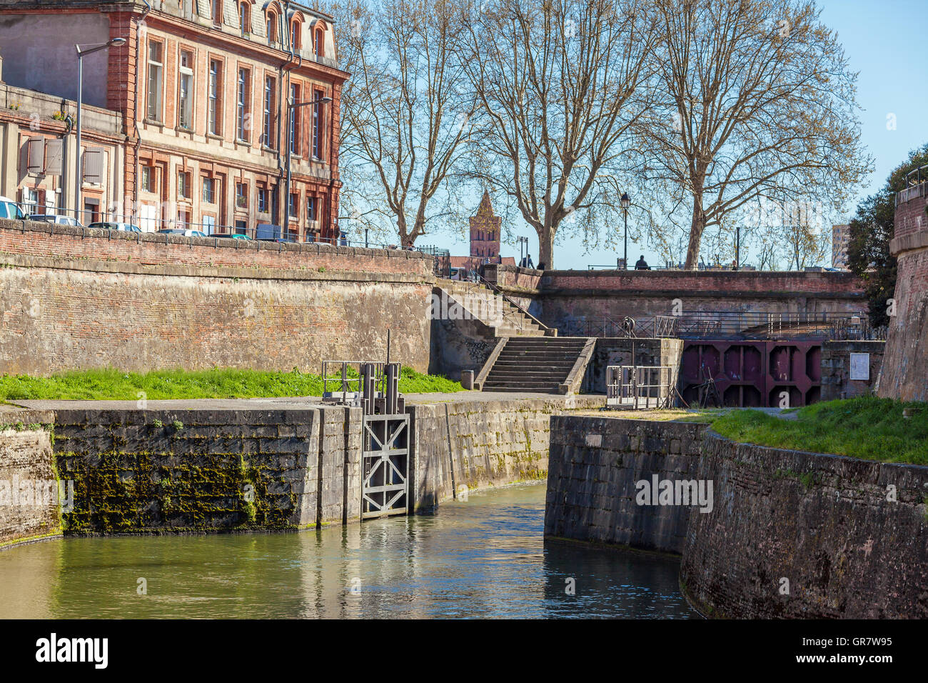 Old gates to Canal du Midi between Garonne River and sea, Toulouse, France Stock Photo