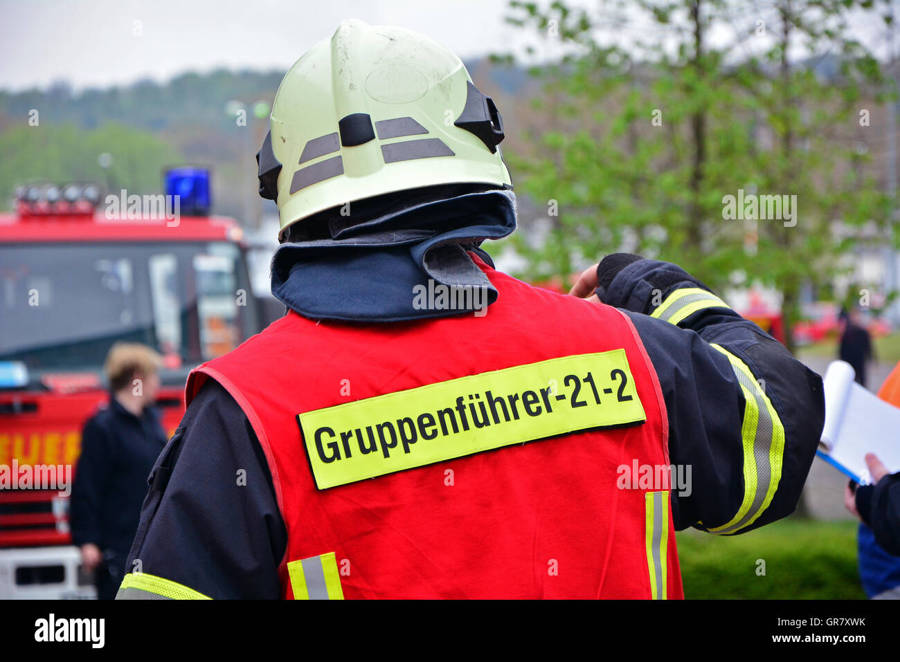 One Male Firefighter During Training On The Road Stock Photo