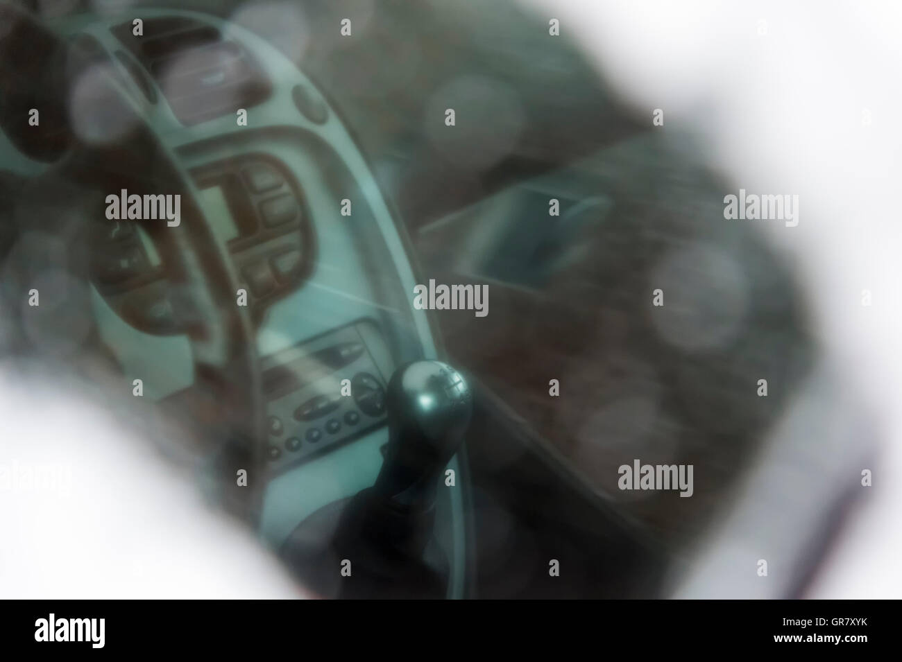 Looking Through A Frozen Side Window Into The Interior Of A Car