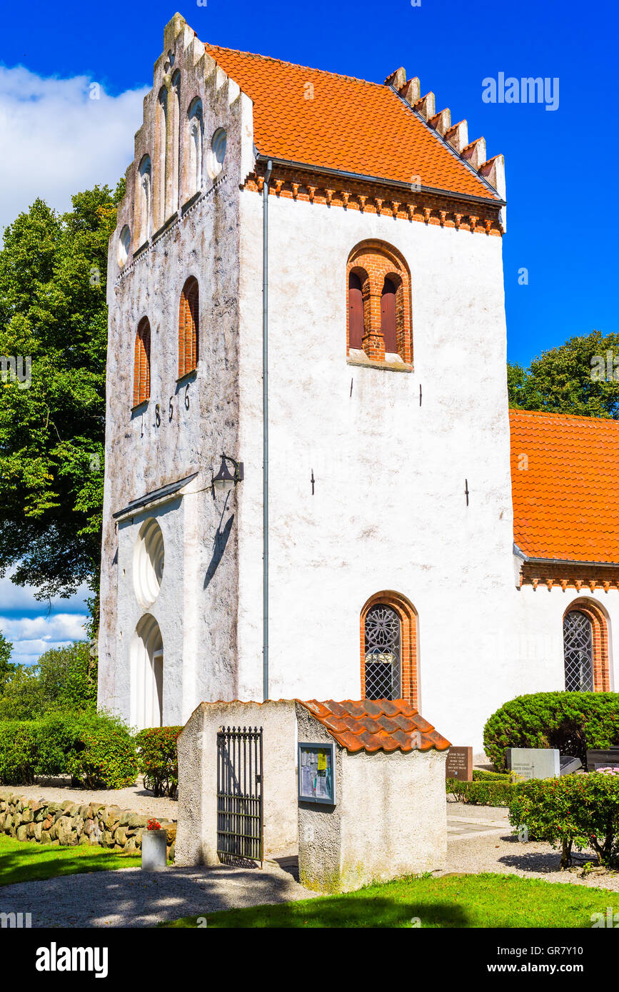 Hurva, Sweden - September 5, 2016: The old church dates back to the 13th century. The tower was added in 1856. Historic religiou Stock Photo