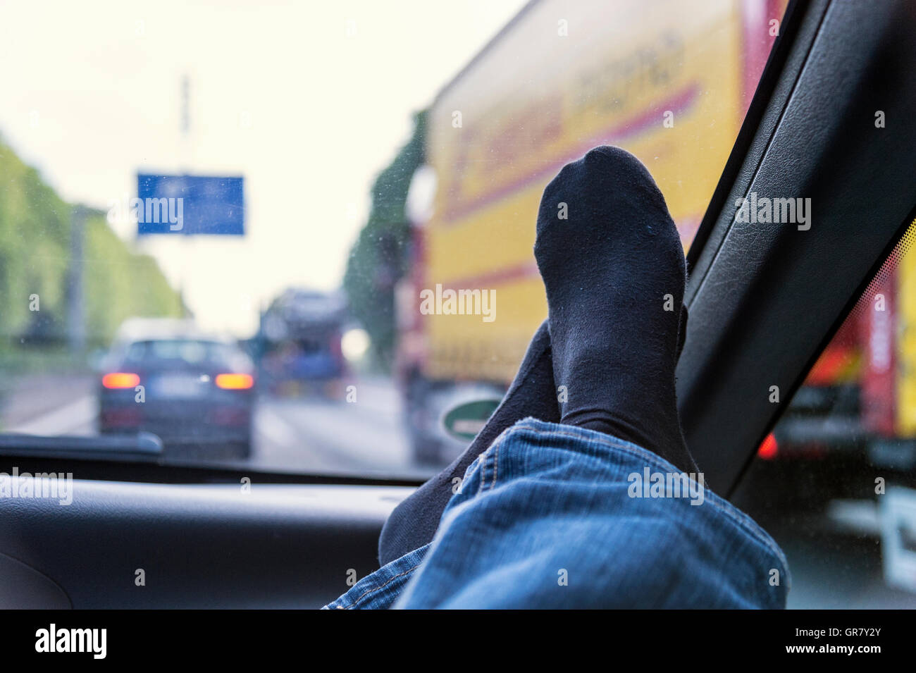 Feet on dashboard car on hires stock photography and images Alamy