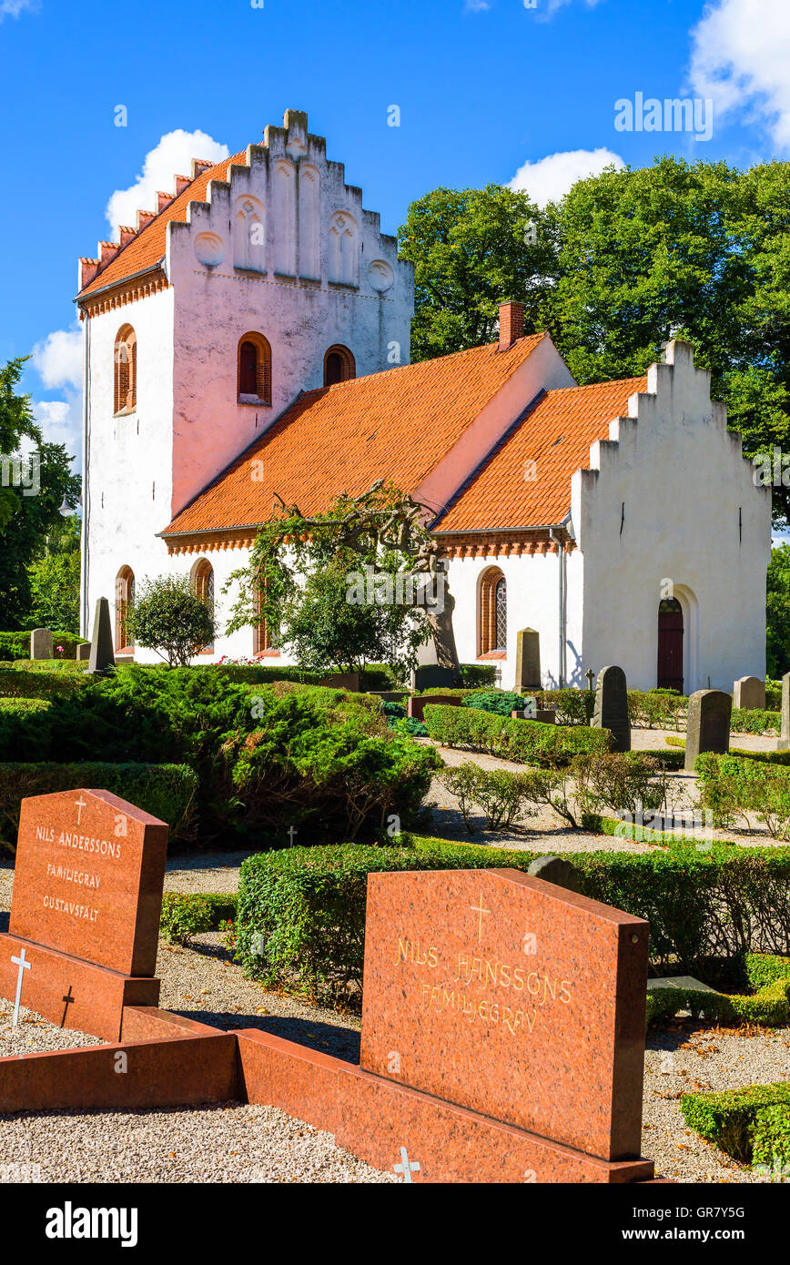 Hurva, Sweden - September 5, 2016: The old church dates back to the 13th century. The tower was added in 1856. Historic religiou Stock Photo