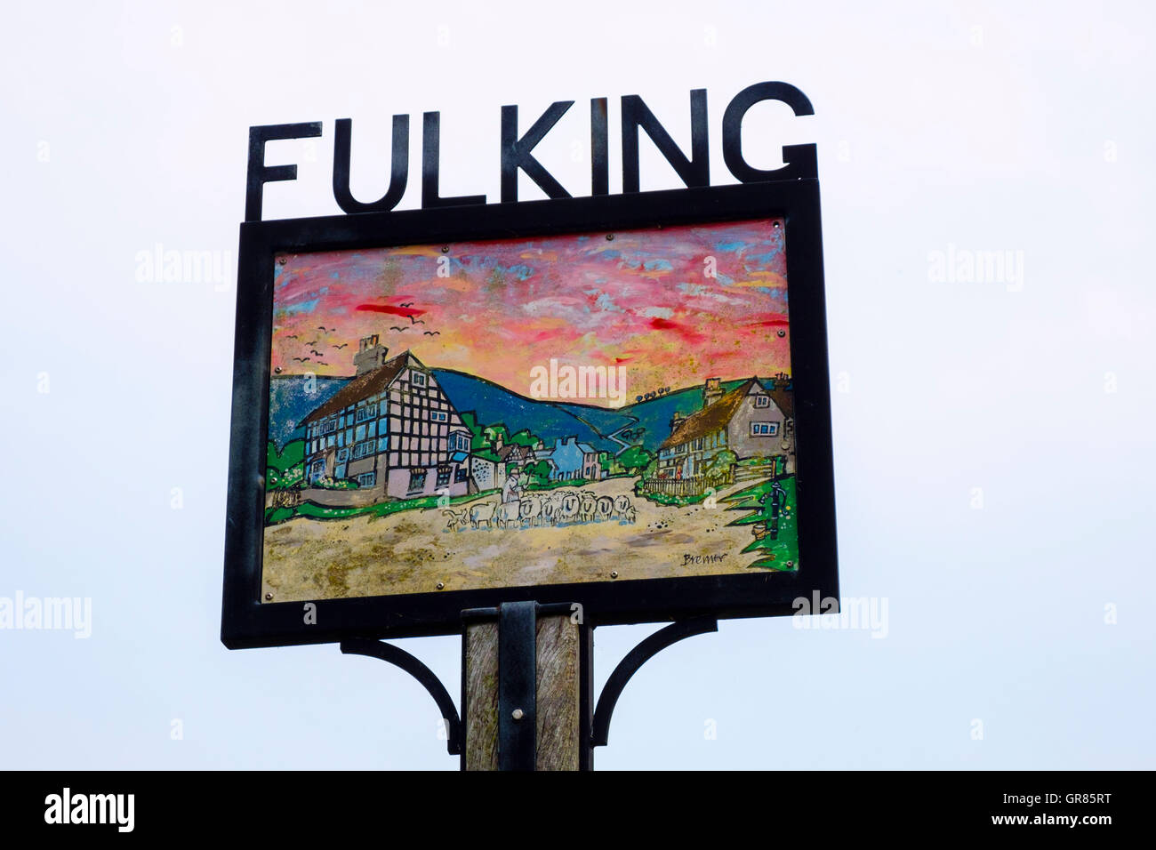 Pictorial village sign depicting historic scene against the sky. Fulking, Henfield, West Sussex, England, UK, Britain Stock Photo