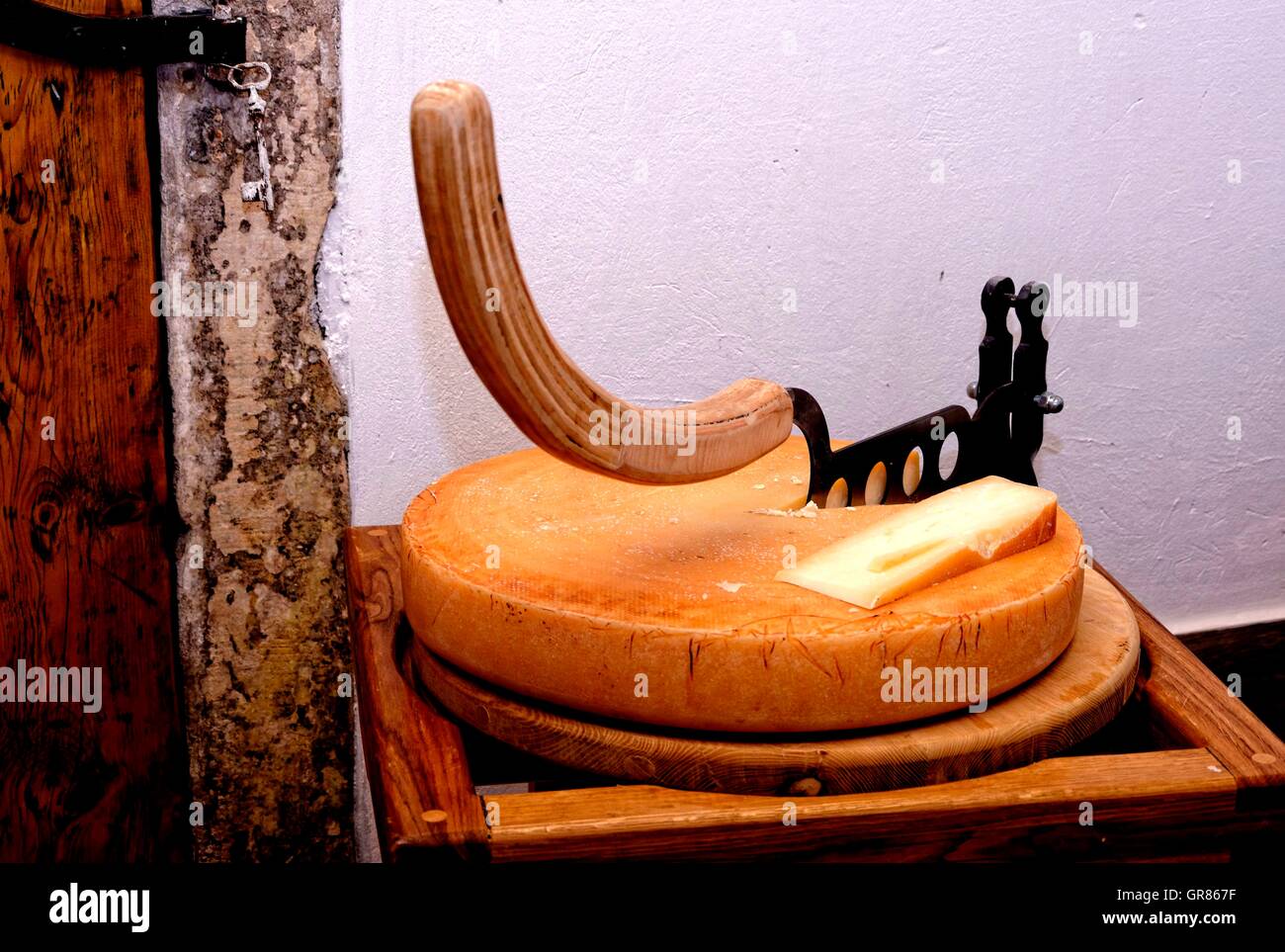 Hard Cheese Loaf Cutter Stock Photo Alamy