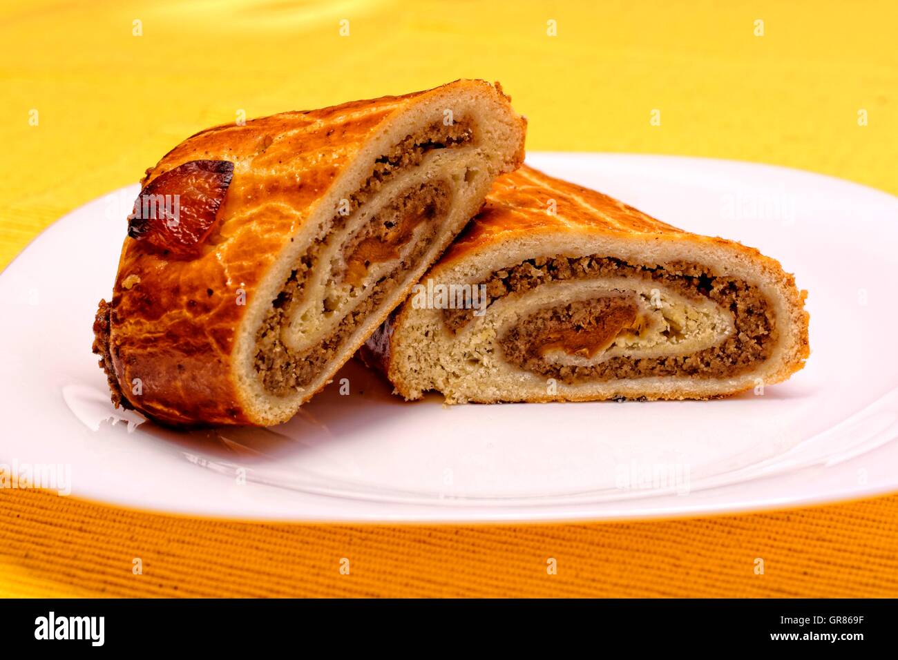 Walnut Or Poppy Seed Roll With Dried Apricots Beigli, An Old-Fashioned Hungarian Weihnachtsgebaeck Stock Photo