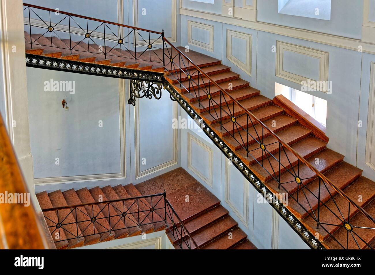 Inside stairs iron railing hi-res stock photography and images - Alamy