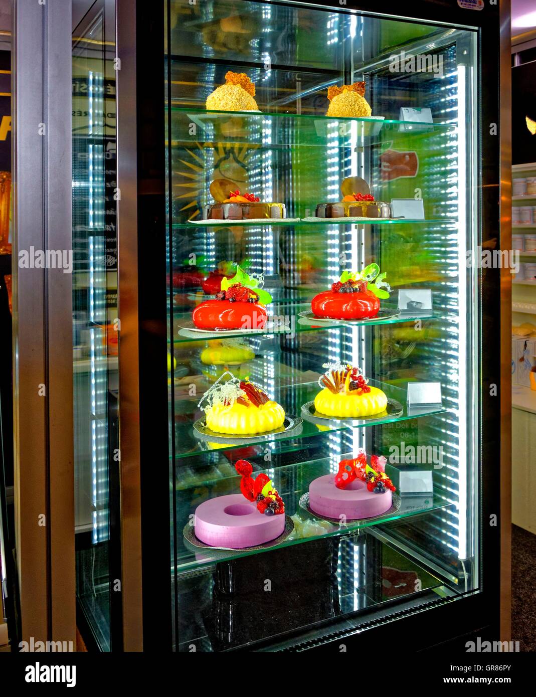 Refrigerator With Semi-Frozen Ice Cream Cakes Stock Photo