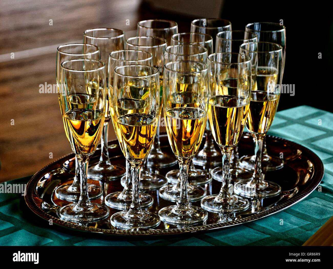Many Champagne Glasses Filled With Champagne On Silver Tray Stock Photo