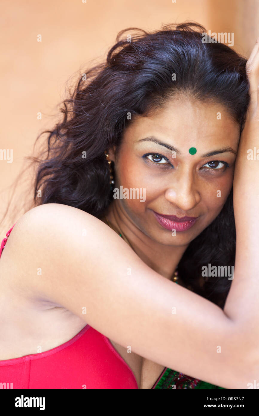 South asian indian woman smiling hi-res stock photography and images ...