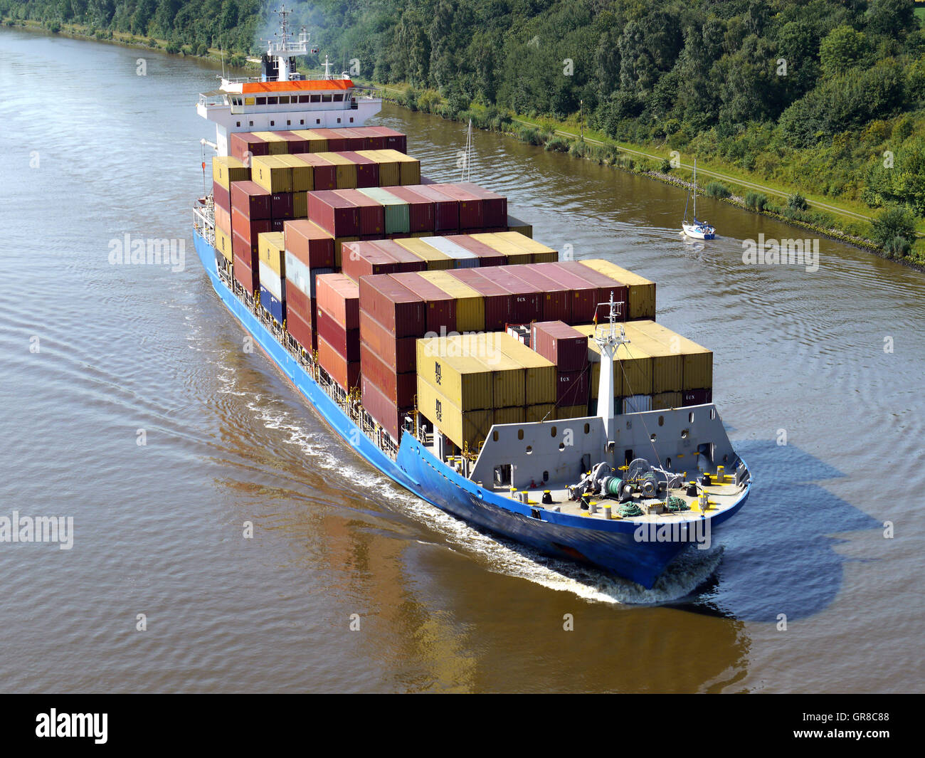 Container Ship In Kiel Canal Stock Photo