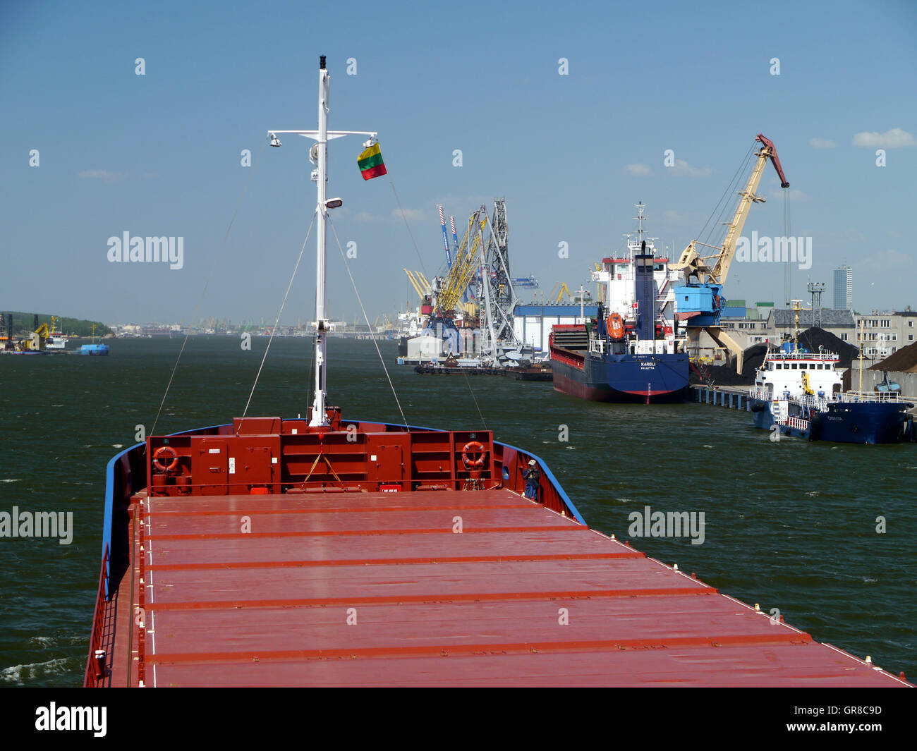 Freighter Arriving Harbour Of Klaipeda Stock Photo