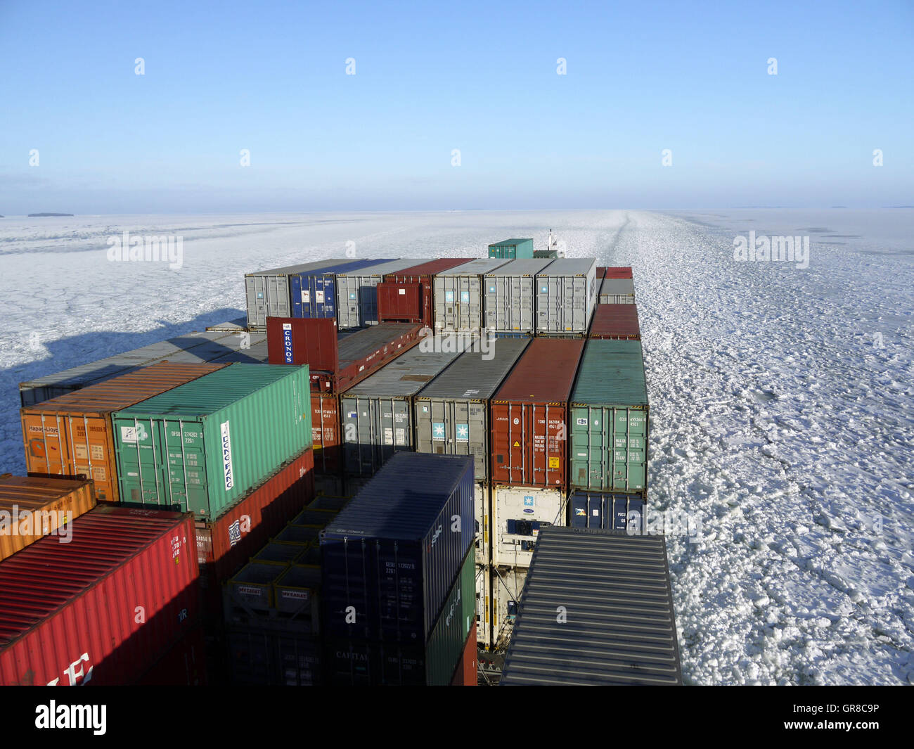 Container Ship In The Ice Stock Photo