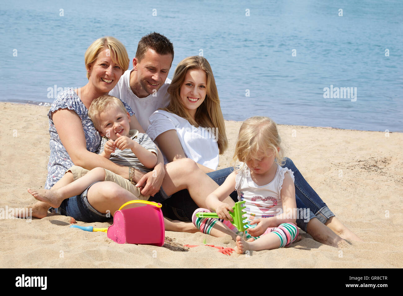 Day at the beach with family hi-res stock photography and images - Alamy