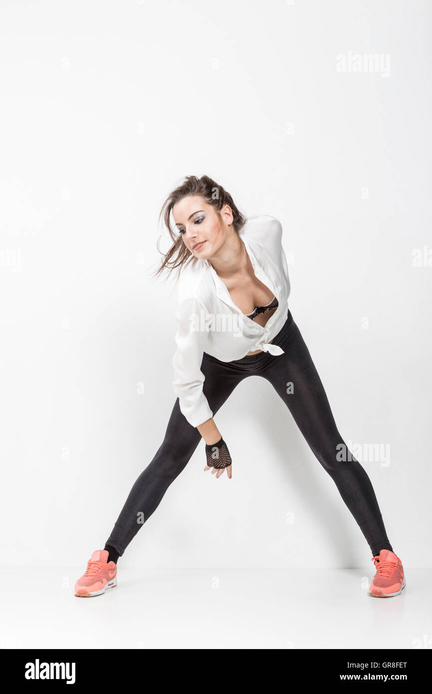 Spirited Young Woman Forgets Everything In Their Dance Stock Photo Alamy