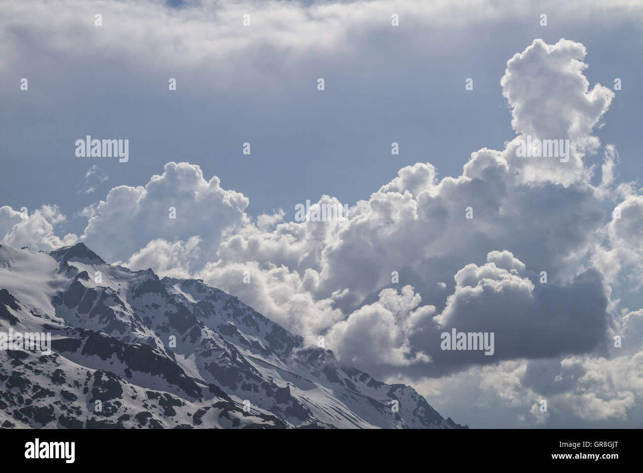 Impressive Clouds Drift In The Urner Alps From Sustenpass Stock Photo