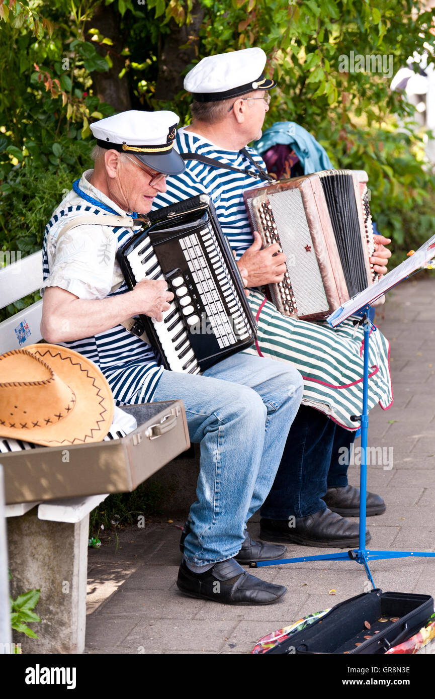 Two Sailors Playing Accordion Stock Photo