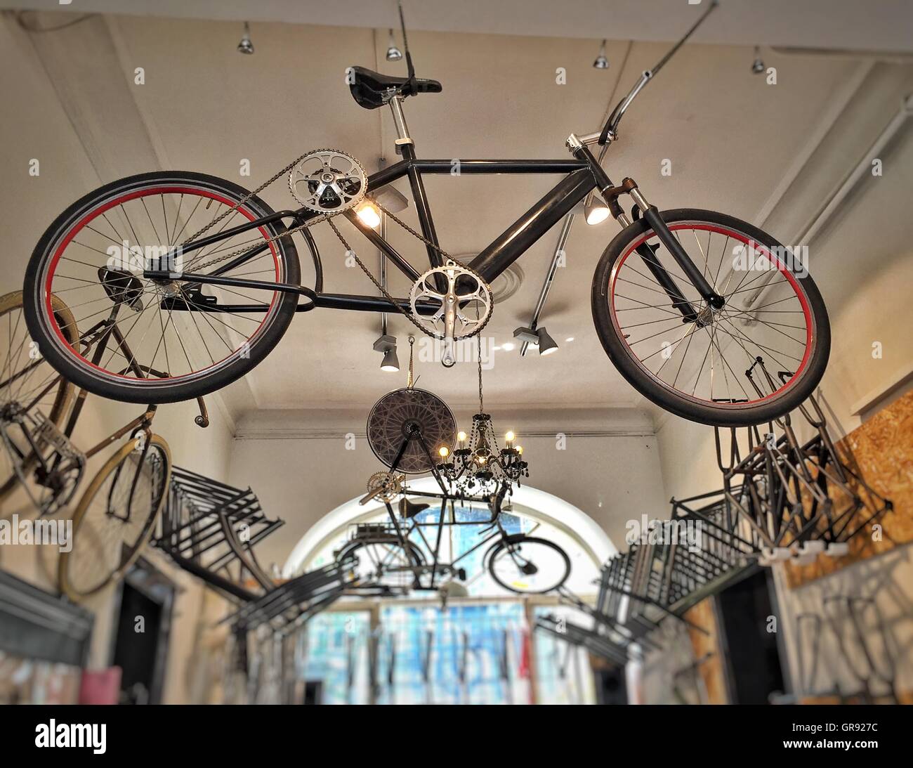 Low Angle View Of Bicycle Hanging From Ceiling In Saga Cykler