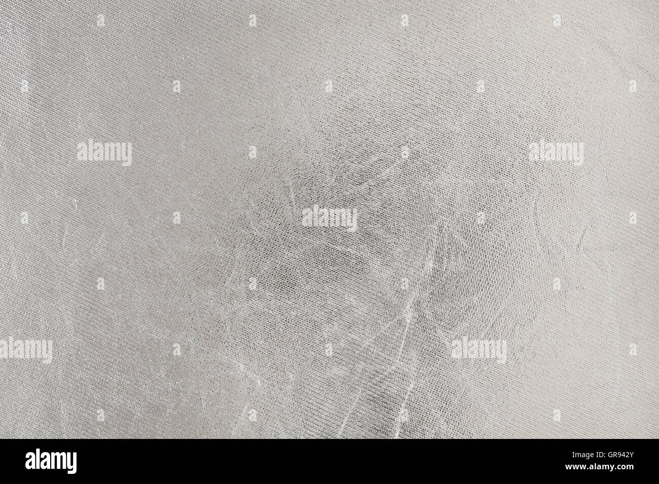Silver metallic scratched background or texture. Stock Photo