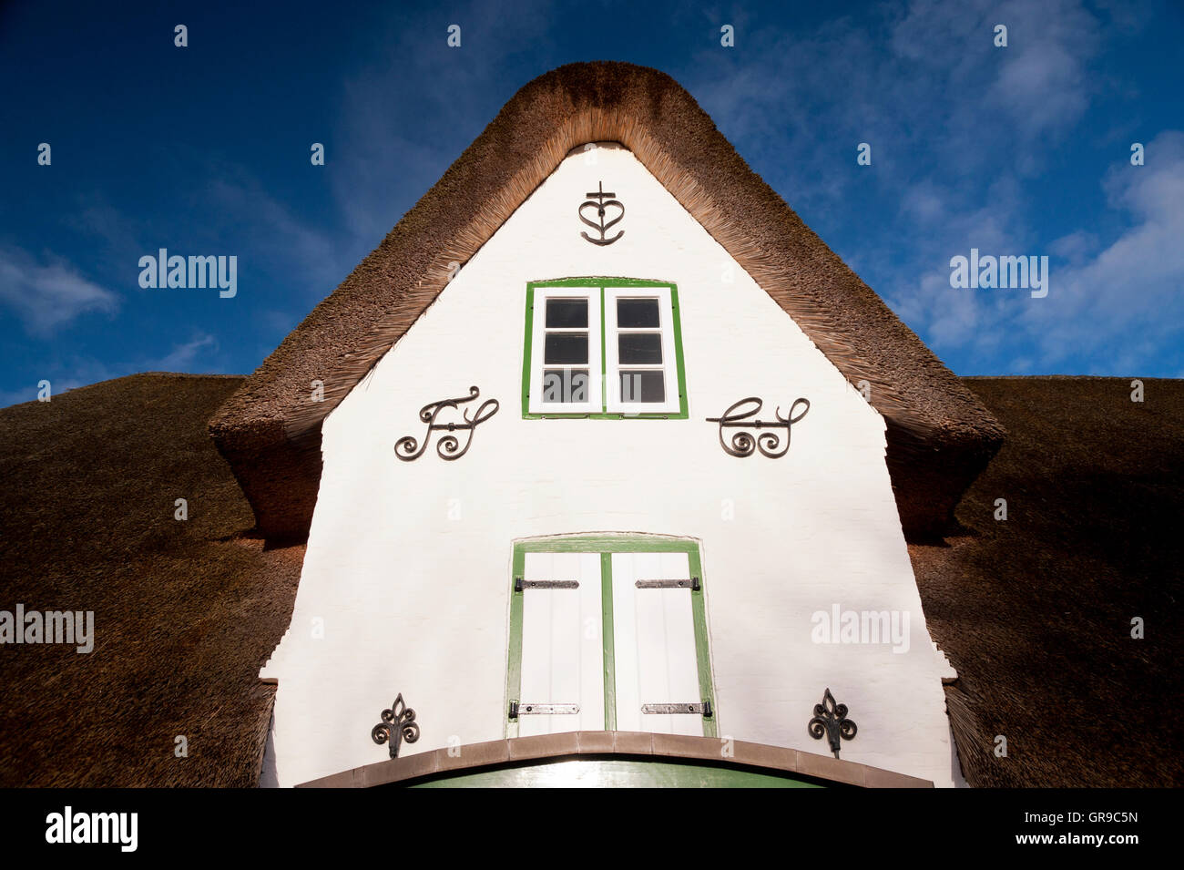 Thatched Roof House On Amrum In Germany Stock Photo