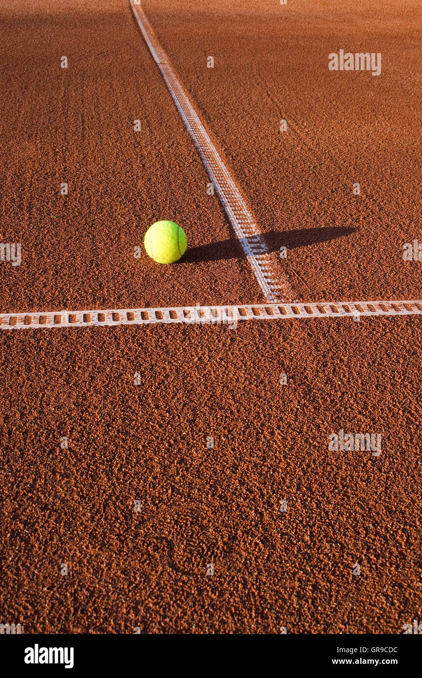 Tennis Ball On Clay Court Stock Photo Alamy