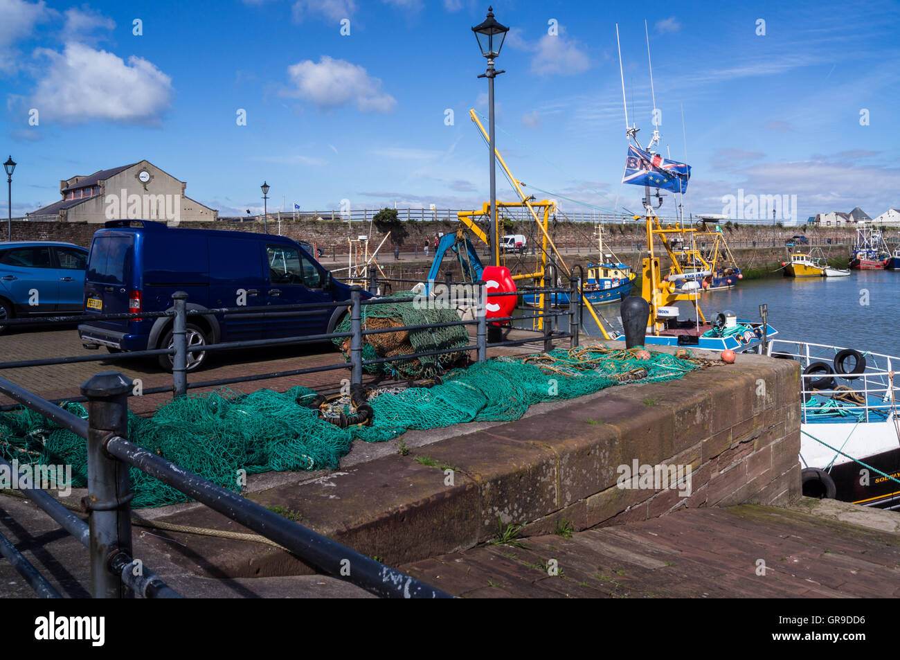 Fishing boat flying BREXIT flag in support of UK exit from EU, Maryport, Cumbria, England Stock Photo