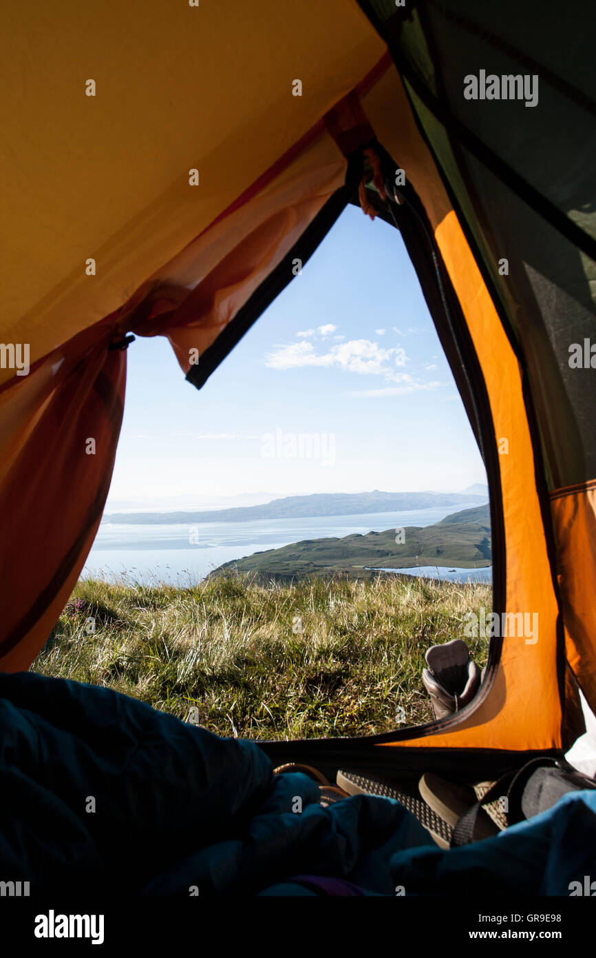 View from inside tent  looking across Sound of Raasay, Isle of Skye, Scotland, United Kingdom Stock Photo