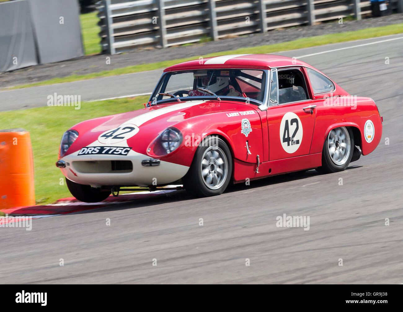 A Historic MG MIdget Sports Car Racing at Oulton Park in the Gold Cup Meeting near Tarporley Cheshire England United Kingdom UK Stock Photo