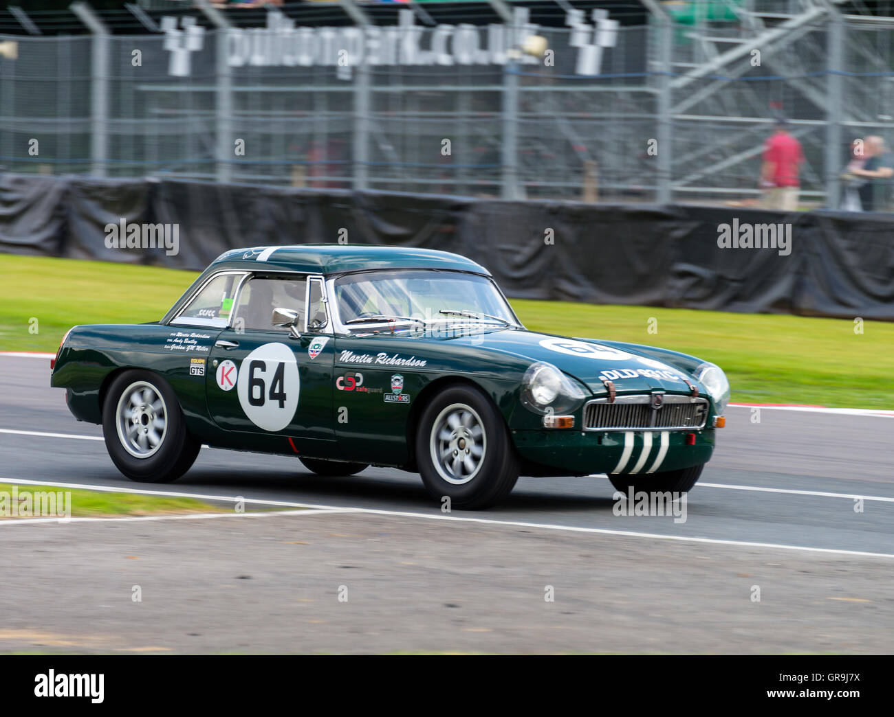 An MGB Sports Car in the Guards Trophy Race at Oulton Park Motor Racing Circuit near Tarporley Cheshire England United Kingdom UK Stock Photo