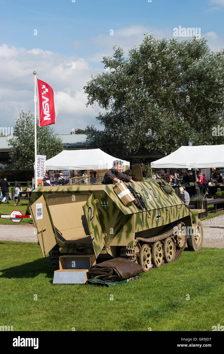 A World War Two German Half-Track Armoured Vehicle and Field Gun at Oulton Park Gold Cup Race Meeting near Tarporley Cheshire England United Kingdom Stock Photo