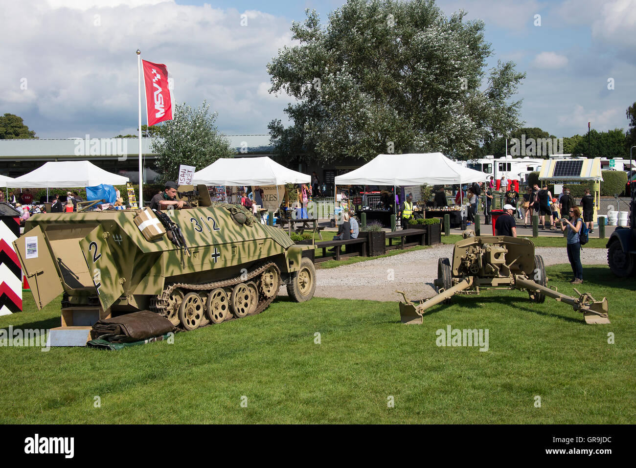 A World War Two German Half-Track Armoured Vehicle and Field Gun at Oulton Park Gold Cup Race Meeting near Tarporley Cheshire England United Kingdom Stock Photo