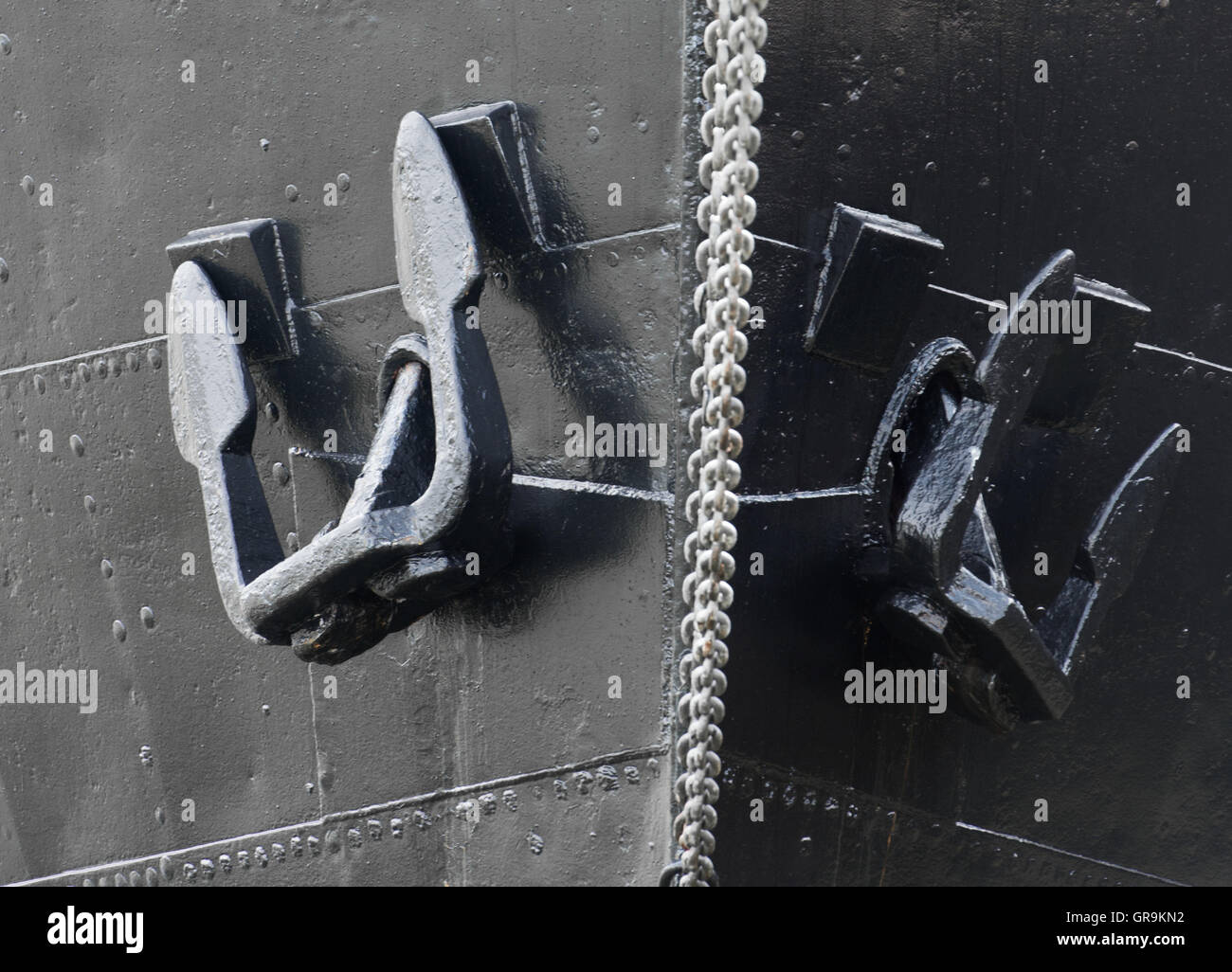 Two Black Anchor At A Black Ship Bow Stock Photo