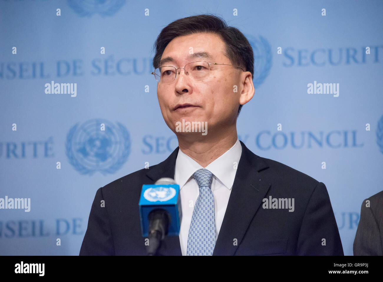 South Korean Deputy Permanent Representative to the UN Hahn Choong-hee speaks with the press. Following the September 5th test launch of what are believed to by three medium-range Rodong-class ballistic missiles by the Democratic People's Republic of Korea (DPRK) toward Japan, the United Nations Security Council held emergency consultations on the incident. Analysts believe that the test, conducted while world leaders met in China for the G20 summit, may have been conducted as a response to the possible installation of a Terminal High Altitude Area Defense (THAAD) system developed to defend So Stock Photo