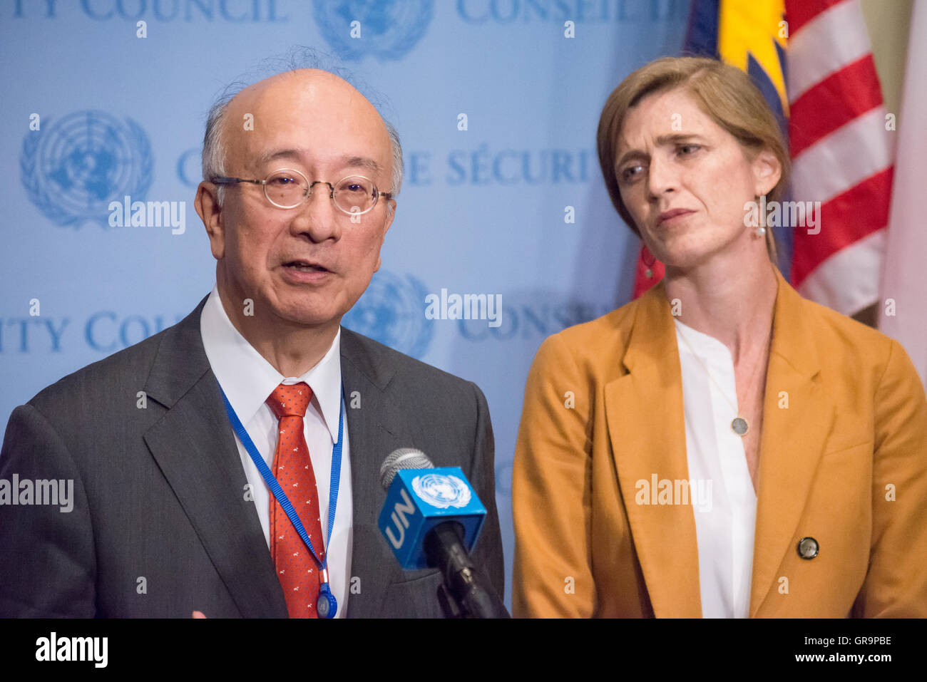 Japanese Ambassador to the United Nations Koro Bessho (left) speaks with the press. Following the September 5th test launch of what are believed to by three medium-range Rodong-class ballistic missiles by the Democratic People's Republic of Korea (DPRK) toward Japan, the United Nations Security Council held emergency consultations on the incident. Analysts believe that the test, conducted while world leaders met in China for the G20 summit, may have been conducted as a response to the possible installation of a Terminal High Altitude Area Defense (THAAD) system developed to defend South Korea Stock Photo