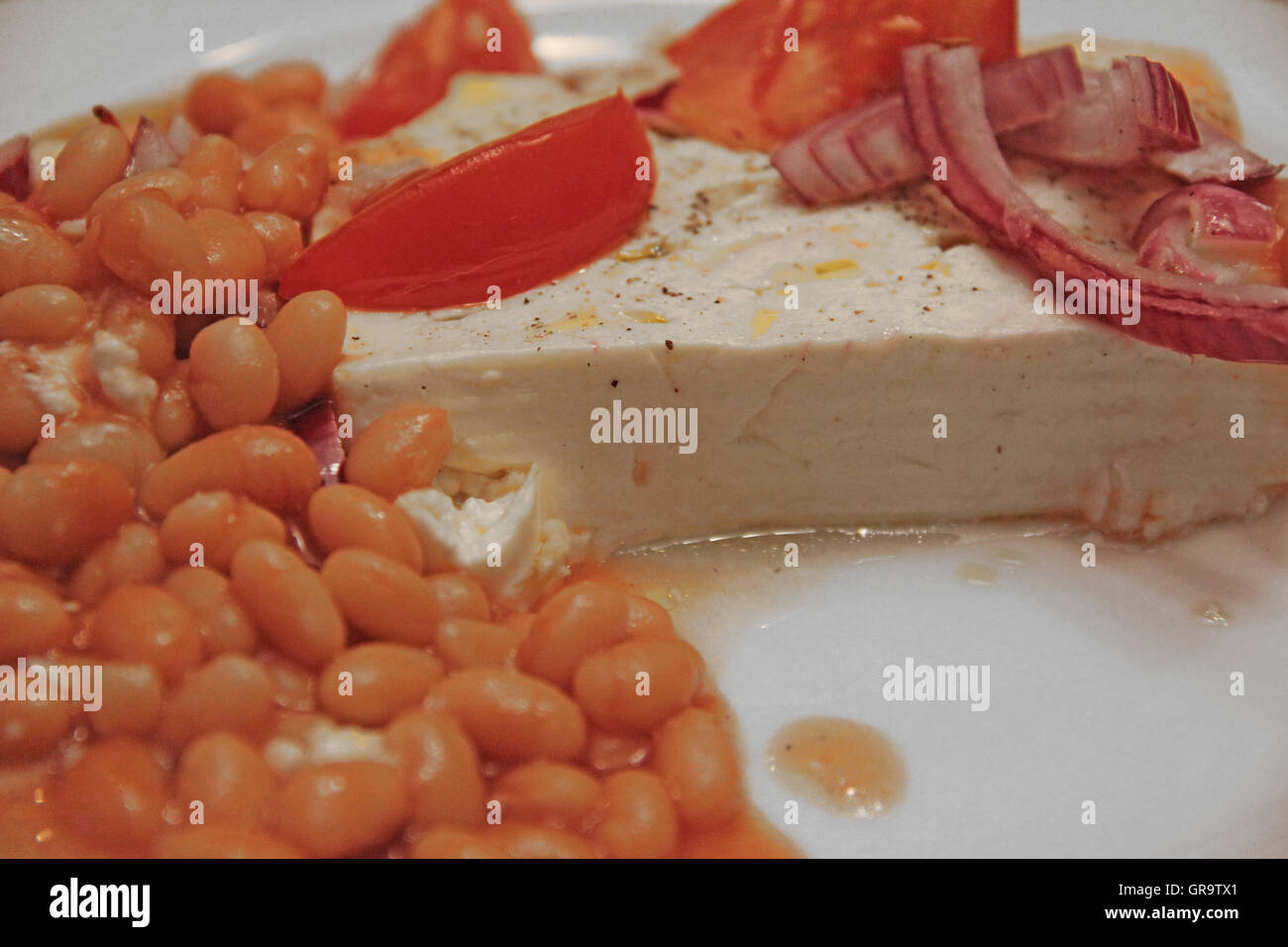 Baked Feta Cheese With Beans Stock Photo Alamy