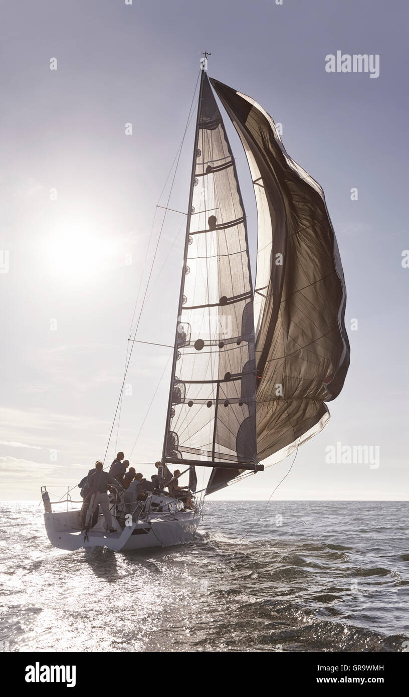 Sailboat on sunny ocean Stock Photo