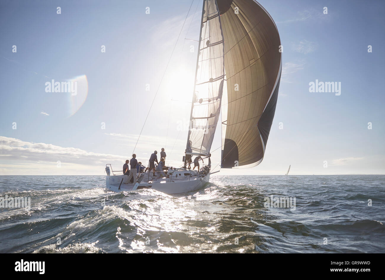 Sailboat on sunny ocean Stock Photo