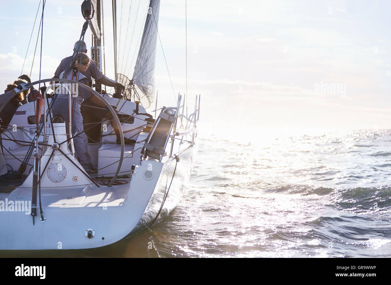 Retired couple sailing on sunny ocean Stock Photo