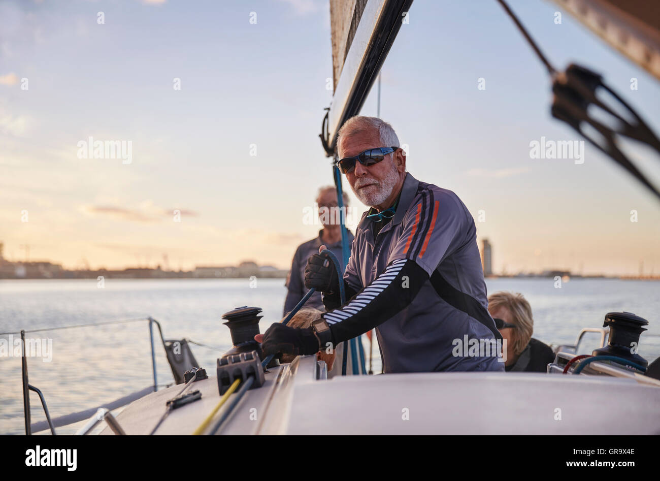 Portrait confident man sailing sailboat Stock Photo
