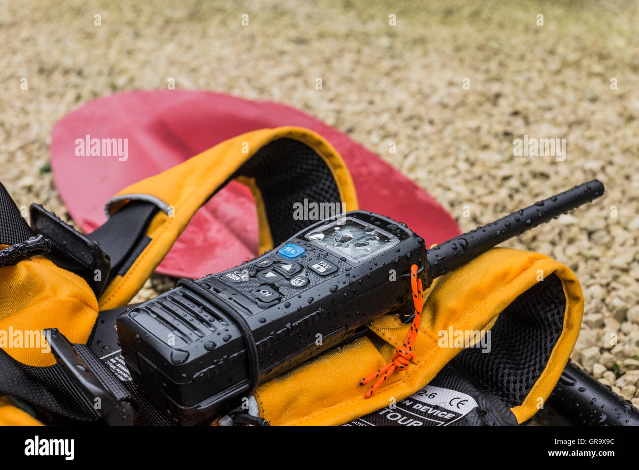 Kayak paddle, buoyancy aid and VHF radio Stock Photo Alamy