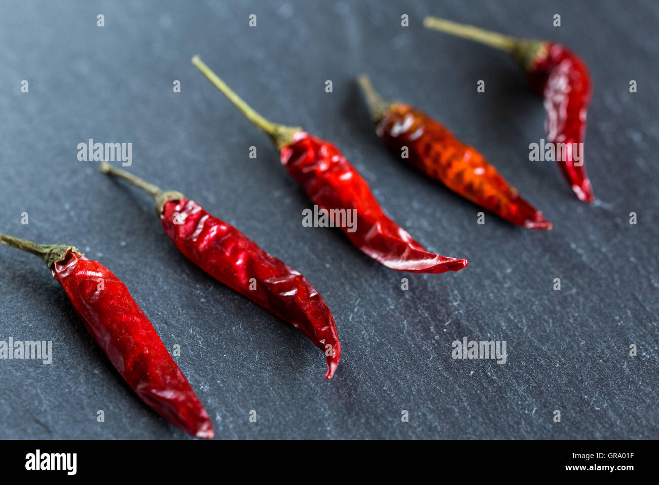 Chilis On A Slate Platter Stock Photo