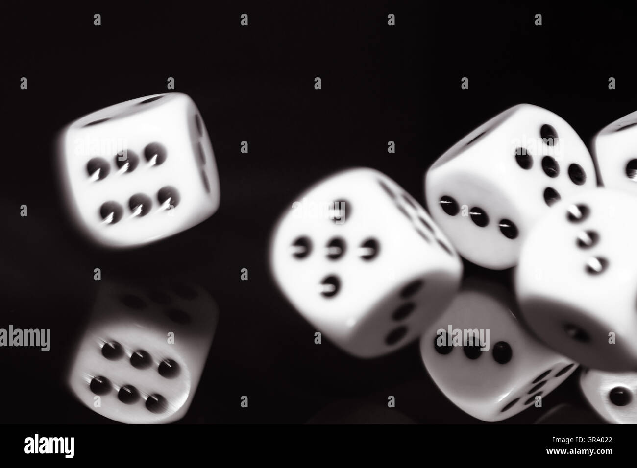 Dice In Motion Stock Photo