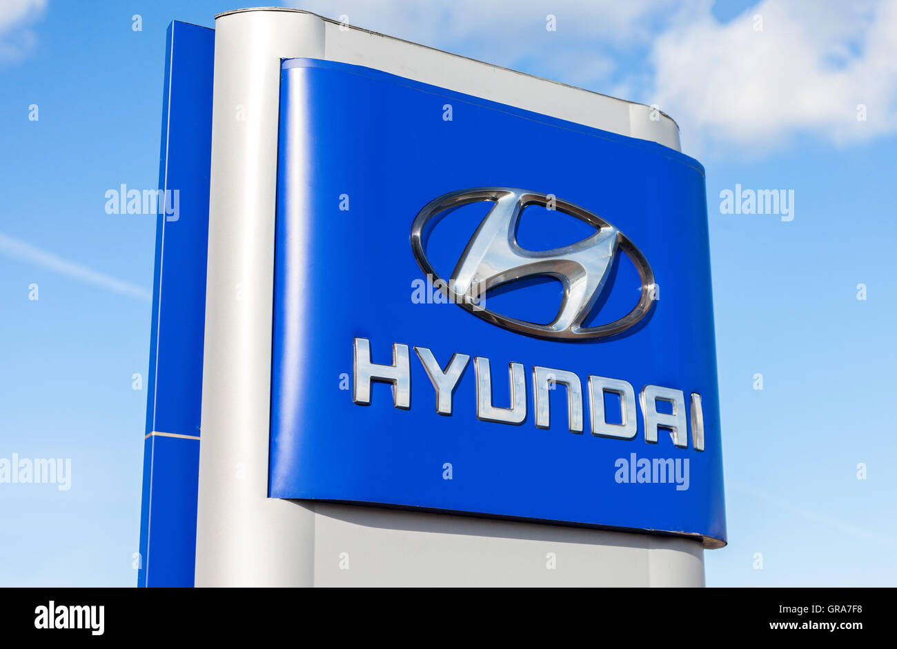 Hyundai dealership sign against blue sky. Hyundai Motor Company is a South Korean multinational