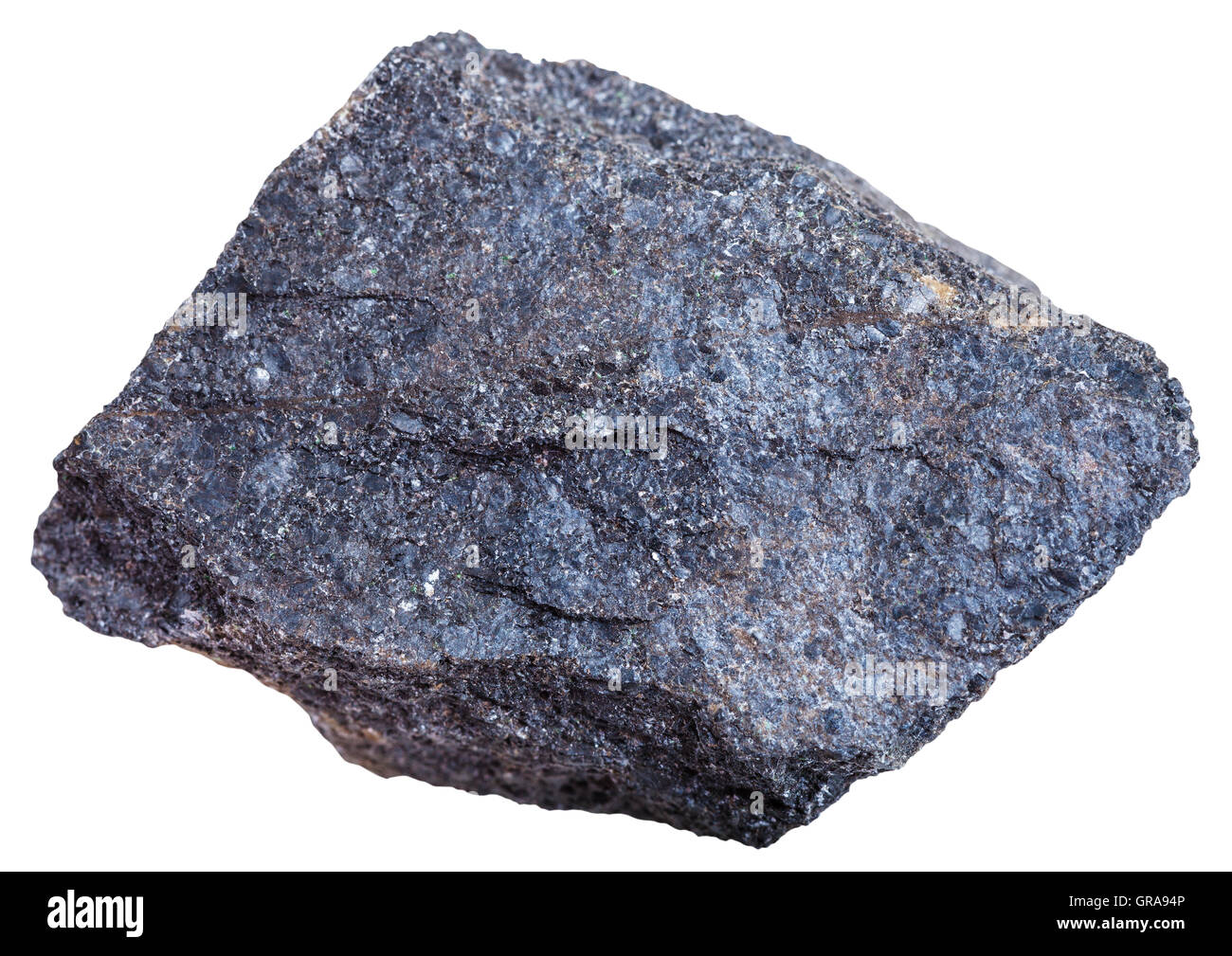 macro shooting of mineral resources - Chromite rock (chromium ore) isolated on white background Stock Photo